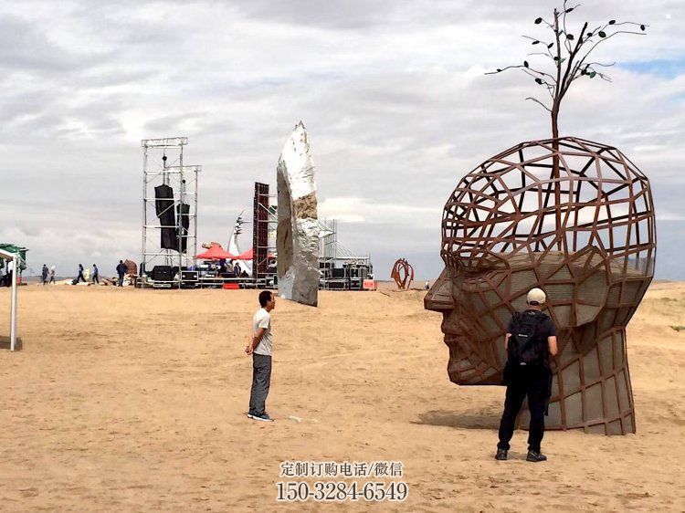 镂空人头像雕塑供应，城区小品，铁艺人头像雕塑制造商